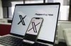 FILE — The opening page of X is displayed on a computer and phone, Oct. 16, 2023, in Sydney. (AP Photo/Rick Rycroft, File)