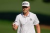 Kristoffer Reitan, of Norway, waves after a birdie on the 15th hole during the final round of the Truist Championship golf tournament at the Quail Hollow Club, Sunday, May 10, 2026, in Charlotte, N.C. (AP Photo/Chris Carlson)