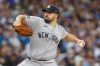 New York Yankees starting pitcher Carlos Rodón throws to the Milwaukee Brewers during the first inning of a baseball game Sunday, May 10, 2026, in Milwaukee. (AP Photo/Jeffrey Phelps)