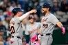 Detroit Tigers' Gage Workman (99) is congratulated by teammate Spencer Torkelson (20) after hitting a home run against the Kansas City Royals during the sixth inning of a baseball game in Kansas City, Mo., Sunday, May 10, 2026. (AP Photo/Reed Hoffmann)