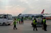 A Turkish Airlines aircraft is seen after passengers were safely evacuated and Nepal's main airport shut down, following a fire on the jet while landing in Kathmandu, Monday, May 11, 2026. (AP Photo/Rajneesh Bhandari)