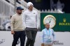 Matt Fitzpatrick, right, and Alex Fitzpatrick walk down the ninth hole during practice before the PGA Championship golf tournament at the Aronimink Golf Club Monday, May 11, 2026, in Newtown Square, Pa. (AP Photo/Matt Slocum)