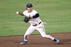 FILE - Tampa Bay Rays shortstop Ha-Seong Kim throws to first base after fielding a ground ball during the eighth inning of a baseball game against the Baltimore Orioles, July 19, 2025, in Tampa, Fla. (AP Photo/Phelan M. Ebenhack, File)
