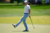 Justin Thomas reacts after missing a putt for birdie on the second hole during the final round of the Truist Championship golf tournament at the Quail Hollow Club, Sunday, May 10, 2026, in Charlotte, N.C. (AP Photo/Chris Carlson)