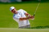 Scottie Scheffler hits from the bunker on the third green during a PGA Championship golf tournament practice round at Aronimink Golf Club, Tuesday, May 12, 2026, in Newtown Square, PA. (AP Photo/Carolyn Kaster)