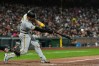 Pittsburgh Pirates' Joey Bart hits an RBI single during the seventh inning of a baseball game against the San Francisco Giants, Saturday, May 9, 2026, in San Francisco. (AP Photo/Godofredo A. Vásquez)