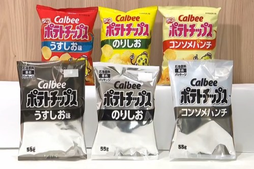 This image made from video provided by Japan's NNN-NTV shows Calbee snack packages in color and black and white in Tokyo, Wednesday, May 13, 2026. (NNN-NTV via AP)