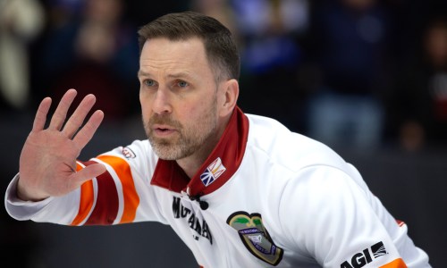 Brad Gushue calls to his teammates during the 3v4 Page Playoffs at the Montana's Brier in St. John's, N.L., on March 7, 2026. THE CANADIAN PRESS/Paul Daly