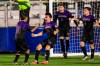 FILE - Washington's Christian Soto (14), Charlie Ostrem (20), Nick Scardina (11), and Kalani Kossa-Rienzi (6) celebrate the team's win over Georgetown in an NCAA men's soccer tournament semifinal game in Cary, N.C., Friday, Dec. 10, 2021. (AP Photo/Ben McKeown, File)