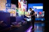 A worker sets up a display of World Cup history during a tour of a FIFA Museum exhibit at Science World in Vancouver, on Wednesday, May 13, 2026. THE CANADIAN PRESS/Ethan Cairns