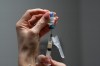 A nurse prepares a combination measles, mumps and rubella vaccine for a 12-month-old at Tiger Pediatrics in Easley, S.C., on March 17, 2026. (AP Photo/Mary Conlon)