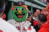 Boston Red Sox's Ceddanne Rafaela is doused with sunflower seeds while celebrating after his two-run home run during the sixth inning of a baseball game against the Philadelphia Phillies, Wednesday, May 13, 2026, in Boston. (AP Photo/Charles Krupa)
