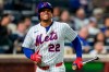 New York Mets designated hitter Juan Soto reacts after getting hit by the ball on his ankle during the third inning of a baseball game against the Detroit Tigers, Wednesday, May 13, 2026, in New York. (AP Photo/Yuki Iwamura)