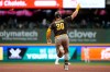 San Diego Padres' Gavin Sheets gestures as he rounds the bases after hitting a three-run home run during the ninth inning of a baseball game against the Milwaukee Brewers, Wednesday, May 13, 2026, in Milwaukee. (AP Photo/Aaron Gash)