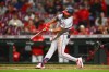Washington Nationals' Daylen Lile hits a two-run home run during the tenth inning of a baseball game against the Cincinnati Reds in Cincinnati, Wednesday, May 13, 2026. (AP Photo/Ben Jackson)