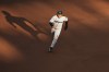 Miami Marlins' Xavier Edwards runs to third base during the first inning of a baseball game against the Minnesota Twins Wednesday, May 13, 2026, in Minneapolis. (AP Photo/Abbie Parr)