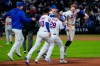 New York Mets' Carson Benge (3), right, celebrates with teammates after hitting a walk-off RBI single during the tenth inning of a baseball game against the Detroit Tigers, Wednesday, May 13, 2026, in New York. (AP Photo/Yuki Iwamura)