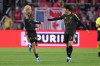 Los Angeles FC's David Martínez (30) is congratulated by teammate Son Heung-Min (7) after scoring during the second half of an MLS soccer match against St. Louis City Wednesday, May 13, 2026, in St. Louis. (AP Photo/Jeff Roberson)