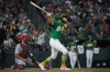 Athletics' Nick Kurtz hits a grand slam during the fifth inning of a baseball game against the St. Louis Cardinals Wednesday, May 13, 2026, in West Sacramento, Calif. (AP Photo/Scott Marshall)