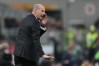 AC Milan's head coach Massimiliano Allegri gives instructions to his players during the Serie A soccer match between AC Milan and Atalanta, in Milan, Italy, Sunday, May 10, 2026. (AP Photo/Antonio Calanni)
