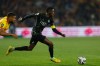 PSG's Ousmane Dembele runs with the ball during the French League One soccer match between Lens and Paris Saint Germain, in Lens, northern France, Wednesday, May 13, 2026. (AP Photo/Jean-Francois Badias)