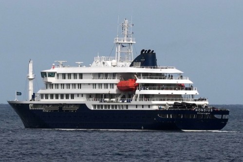 The MV Hondius cruise ship departs the port in Praia, Cape Verde, Wednesday, May 6, 2026. (AP Photo/Misper Apawu)