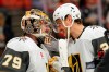 Vegas Golden Knights goaltender Carter Hart, left, and center Brett Howden congratulate each other after the Golden Knights defeated the Anaheim Ducks in Game 6 of a second-round NHL hockey Stanley Cup playoff series Thursday, May 14, 2026, in Anaheim, Calif. (AP Photo/Mark J. Terrill)