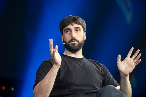 Aidan Gomez of Cohere gives remarks during the All In AI conference in Montreal on Thursday, Sept., 25, 2025.  THE CANADIAN PRESS/Christopher Katsarov
