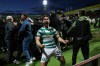 Celtic's Anthony Ralston celebrates after Kelechi Iheanacho scores their side's third goal from a penalty during the Scottish Premiership soccer match between Motherwell and Celtic, Wednesday, May 13, 2026, in Motherwell, Scotland. (Robert Perry/PA via AP)