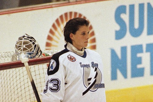 FILE - Tampa Bay Lightning goaltender Manon Rheaume listens to the national anthem prior to her professional debut against the St. Louis Blues on Sept. 23, 1992 at the Tampa Fairgrounds in Tampa, Fla. (AP Photo/Chris O’Meara, File)