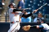 FILE - Baltimore Orioles' Jordan Westburg (11) watches the flight of the ball after hitting a pitch as Tampa Bay Rays catcher Danny Jansen, right, looks on during the seventh inning of a baseball game, July 20, 2025, in Tampa, Fla. (AP Photo/Phelan M. Ebenhack, File)