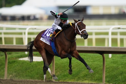 Tyler Gaffalione, atop My Miss Mo, leads the pack during the 102nd running of the Black-Eyed Susan horse race, Friday, May 15, 2026, at Laurel Park in Laurel, Md. (AP Photo/Stephanie Scarbrough)