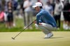 Alex Smalley lines up his putt on the 17th green during the second round of the PGA Championship golf tournament at Aronimink Golf Club, Friday, May 15, 2026, in Newtown Square, PA. (AP Photo/Matt Slocum)