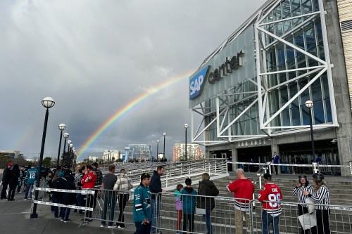 FILE - A rainbow is shown as fans line up outside SAP Center at San Jose before an NHL hockey game between the Chicago Blackhawks and the San Jose Sharks in San Jose, Calif., March 23, 2024. (AP Photo/Jeff Chiu, File)