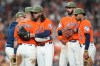 Houston Astros starting pitcher Spencer Arrighetti, center left, hugs Christian Walker after a single by Texas Rangers' Justin Foscue broke up his no-hit bid during the eighth inning of a baseball game, Friday, May 15, 2026, in Houston. (AP Photo/Karen Warren)