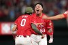 St. Louis Cardinals' Yohel Pozo (63) is congratulated by teammate Masyn Winn (0) after hitting a walk-off single to defeat the Kansas City Royals during the 11th inning of a baseball game Friday, May 15, 2026, in St. Louis. (AP Photo/Jeff Roberson)
