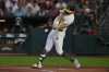 Athletics' Nick Kurtz (16) connects for a three-run home run in the fifth inning of a baseball game against the San Francisco Giants the in West Sacramento, Calif., Friday, May 15, 2026. (Jose Carlos Fajardo/Bay Area News Group via AP)