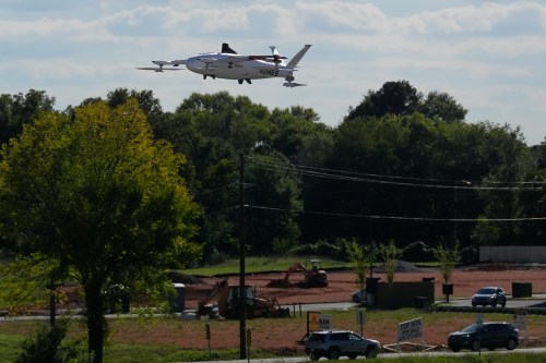 A drone operated by Zipline flies to make a delivery from a Walmart store in Pea Ridge, Ark., Friday, Sept. 26, 2025. (AP Photo/Charlie Riedel)