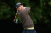 Michael Kim, of South Korea, watches his tee shot on the fourth hole during the first round of the PGA Championship golf tournament practice round at Aronimink Golf Club, Thursday, May 14, 2026, in Newtown Square, PA. (AP Photo/Matt Slocum)