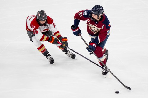 Emily Clark (26) of the Ottawa Charge defends against the Montreal Victoire's Maggie Flaherty (91) during first period PWHL playoff action in Laval, Que., on May 16, 2026. THE CANADIAN PRESS/Christopher Katsarov