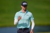 Alex Smalley waves on the 10th green during the third round of the PGA Championship golf tournament at Aronimink Golf Club, Saturday, May 16, 2026, in Newtown Square, PA. (AP Photo/Matt Slocum)
