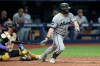 Miami Marlins' Liam Hicks watches his two-run single off Tampa Bay Rays pitcher Hunter Bigge during the 10th inning of a baseball game Saturday, May 16, 2026, in St. Petersburg, Fla. (AP Photo/Chris O'Meara)