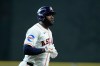 Houston Astros designated hitter Yordan Alvarez runs the bases after hitting a home run during the first inning of a baseball game against the Texas Rangers, Saturday, May 16, 2026, in Houston. (AP Photo/Kevin M. Cox)