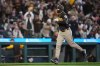 San Diego Padres' Nick Castellanos jogs home after hitting a three-run home run against the Seattle Mariners during the fourth inning of a baseball game, Saturday, May 16, 2026, in Seattle. (AP Photo/Lindsey Wasson)