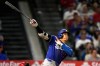 Los Angeles Dodgers' Shohei Ohtani hits a two-run triple during the eighth inning of a baseball game against the Los Angeles Angels, Saturday, May 16, 2026, in Anaheim, Calif. (AP Photo/Mark J. Terrill) CORRECTION: After official review, changed from three-run inside-the-park home run to two-run triple after a throwing error