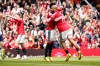 Manchester United's Bryan Mbeumo, right, celebrates after scoring his side's third goal during the English Premier League soccer match between Manchester United and Nottingham Forest in Manchester, England, Sunday, May 17, 2026. (AP Photo/Dave Thompson)