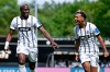 Elversberg's David Mokwa, left, celebrates scoring their second goal of the game with Bambase Conte during the Bundesliga 2 soccer match between SV Elversberg and SC Preußen Münster in Spiesen-Elversberg, Germany, Sunday May 17, 2026. (Uwe Anspach/dpa via AP)