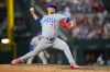 Chicago Cubs pitcher Javier Assad throws to the Texas Rangers during the sixth inning of a baseball game Friday, May 8, 2026, in Arlington, Texas. (AP Photo/Julio Cortez)