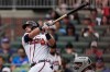 Atlanta Braves third baseman Austin Riley hits a three-run homer against the Boston Red Sox in the first inning of a baseball game, Sunday, May 17, 2026, in Atlanta. (AP Photo/Mike Stewart)