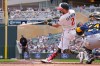Minnesota Twins' Kody Clemens hits an RBI double against the Milwaukee Brewers in the first inning of a baseball game Sunday, May 17, 2026, in Minneapolis. (AP Photo/Bruce Kluckhohn)